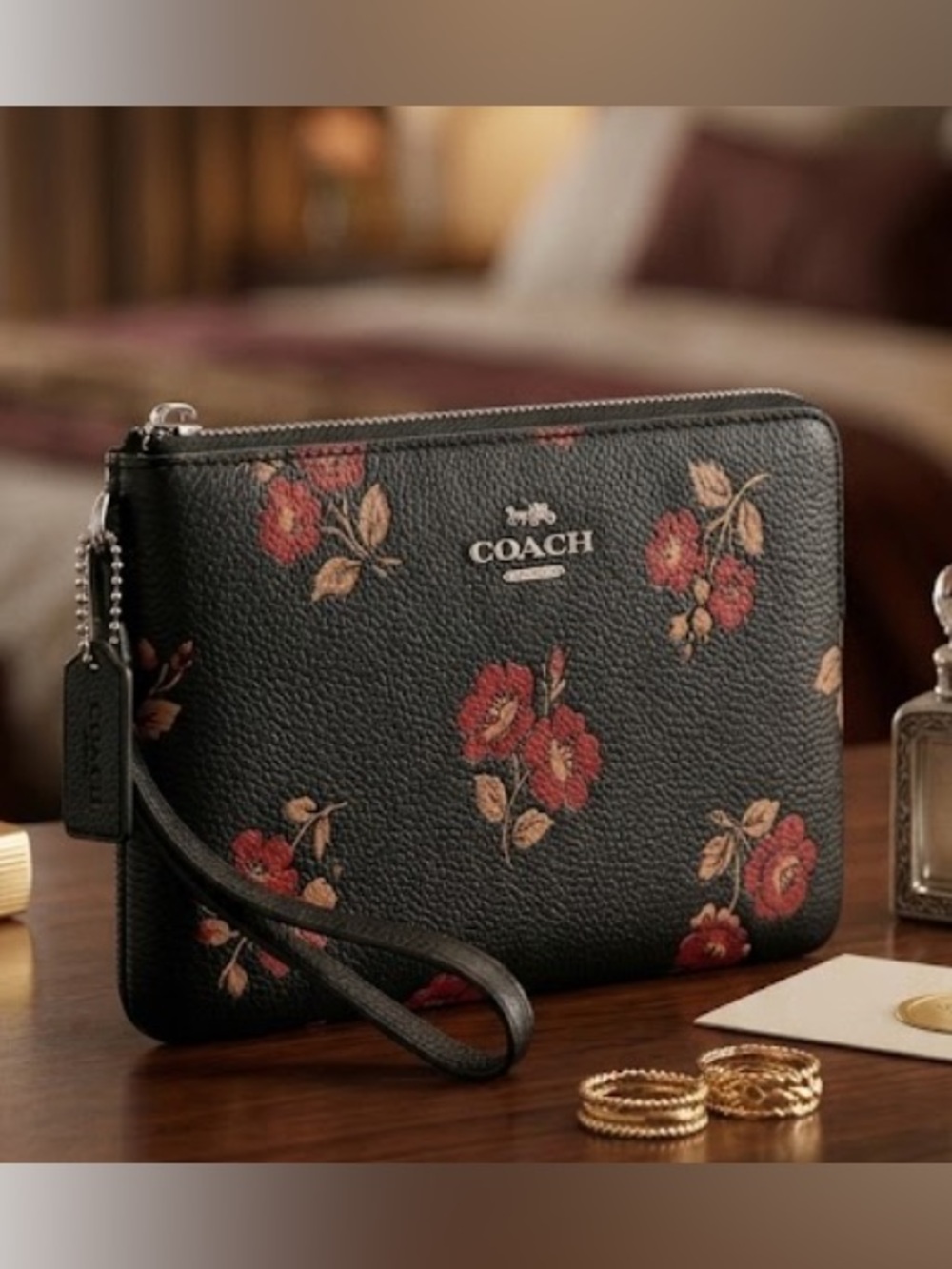 Coach Black Leather Wristlet with Red and Tan Floral Print